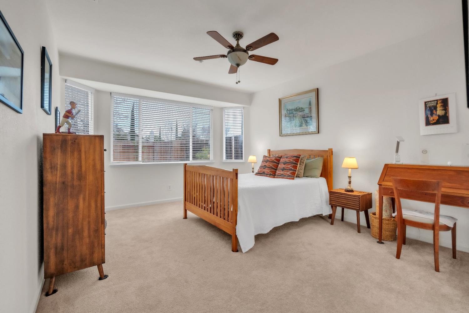 3509 Boulder Ridge Court Rocklin, CA 95765 - Photo 16 of 46 a bedroom with a bed and a table with chair