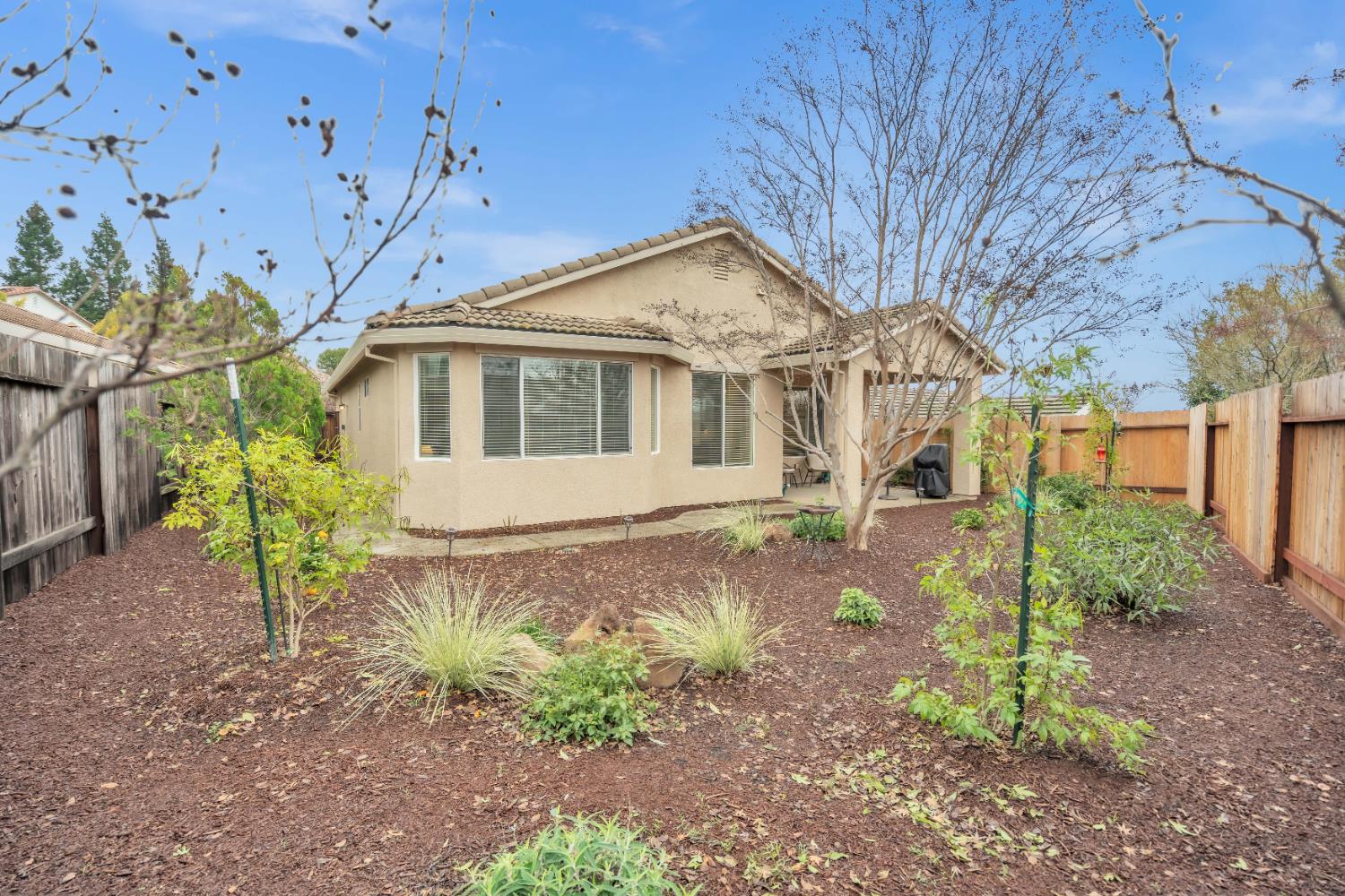 3509 Boulder Ridge Court Rocklin, CA 95765 - Photo 25 of 46 a view of a house with a yard