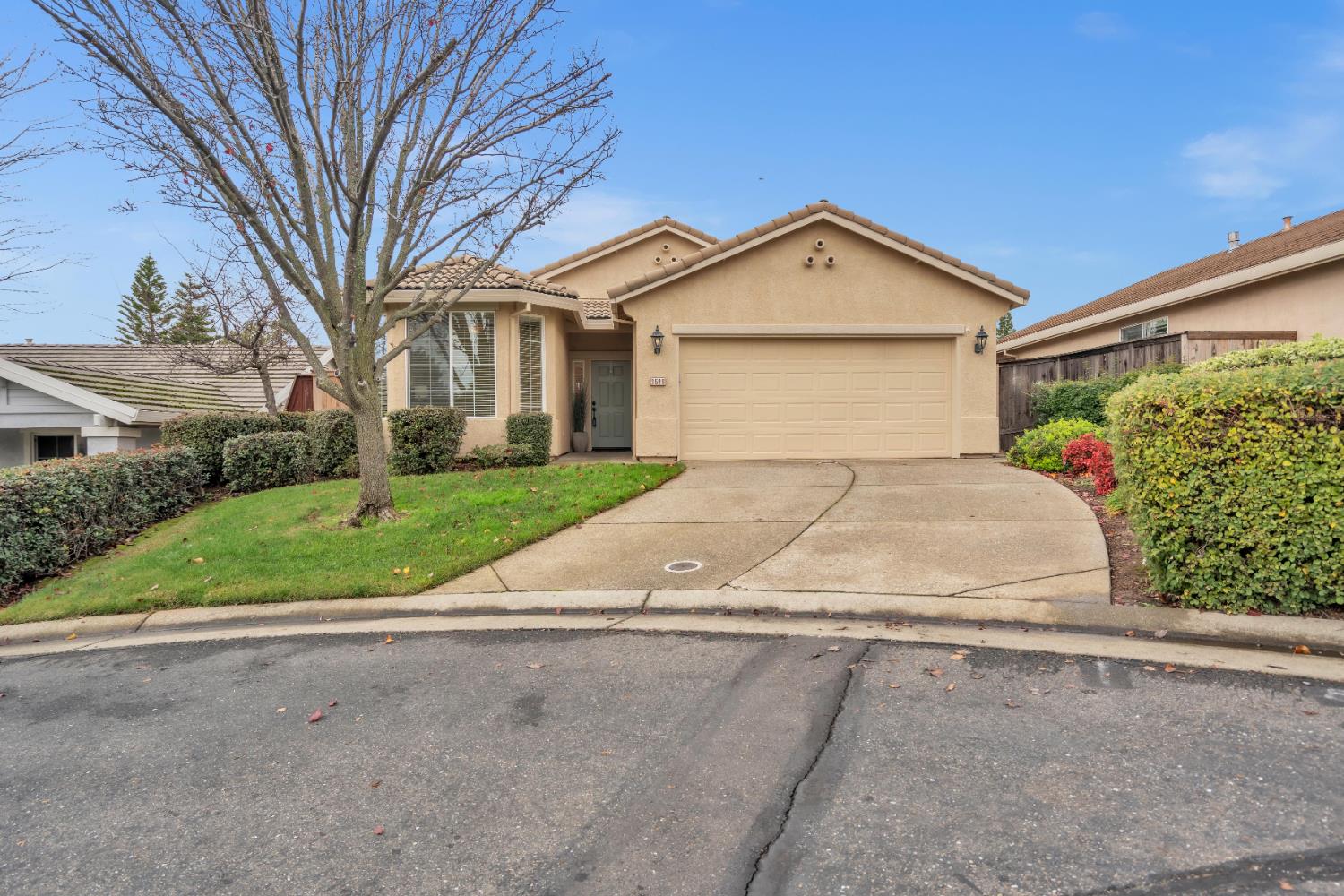 3509 Boulder Ridge Court Rocklin, CA 95765 - Photo 29 of 46 a view of a house with a yard and garage