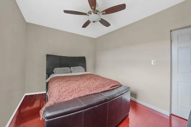 a view of a house with white wall and a refrigerator