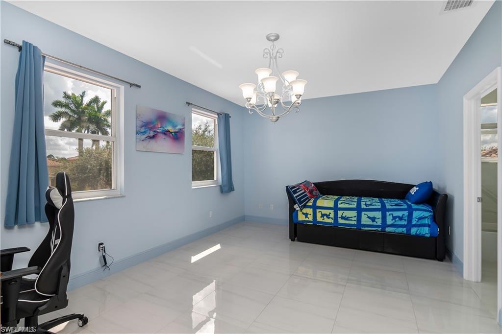 2181 Vardin Place Naples, FL 34120 - Photo 26 of 37 a view of a room with workspace