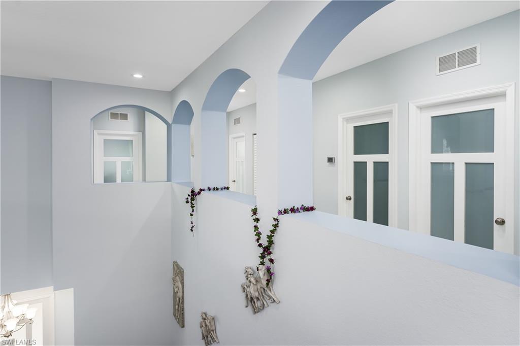 2181 Vardin Place Naples, FL 34120 - Photo 7 of 37 a large room with window in it