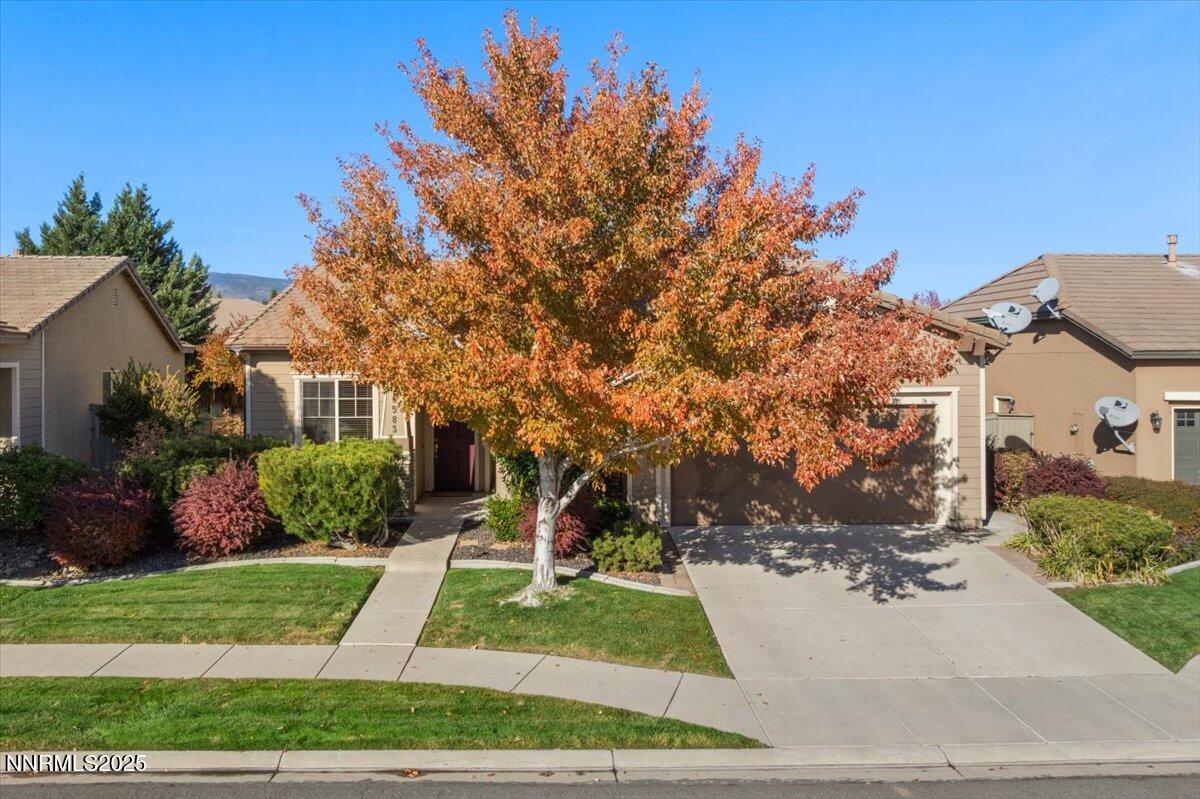 10583 Crystal Bay Drive Reno, NV 89521 - Photo 2 of 43 a front view of a house with a yard