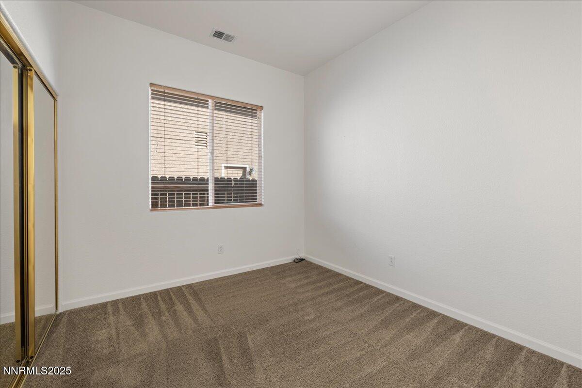 10583 Crystal Bay Drive Reno, NV 89521 - Photo 27 of 43 an empty room with a window