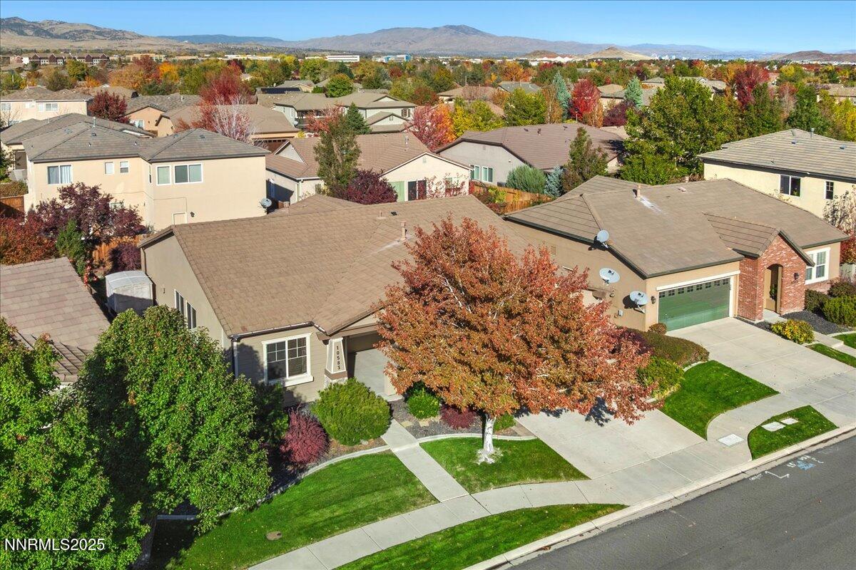 10583 Crystal Bay Drive Reno, NV 89521 - Photo 3 of 43 an aerial view of multiple houses with a yard