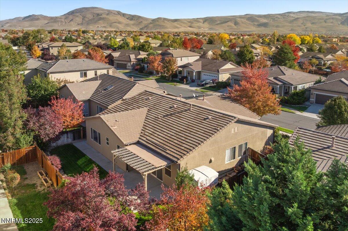 10583 Crystal Bay Drive Reno, NV 89521 - Photo 38 of 43 an aerial view of a house with a mountain