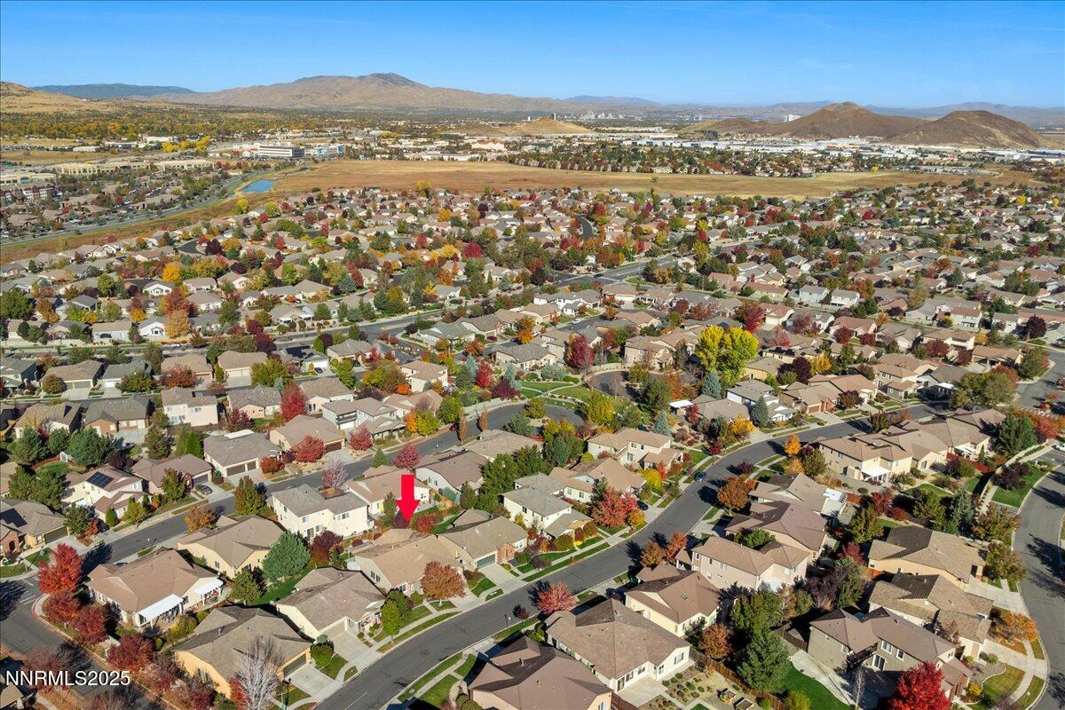 10583 Crystal Bay Drive Reno, NV 89521 - Photo 41 of 43 an aerial view of residential houses with outdoor space and trees