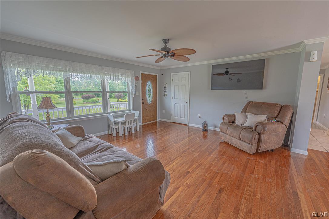 897 North Summit Road Bath, PA 18014 - Photo 3 of 35 a living room with furniture and a large window