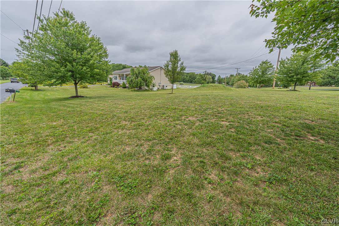 897 North Summit Road Bath, PA 18014 - Photo 33 of 35 a view of a green field with trees