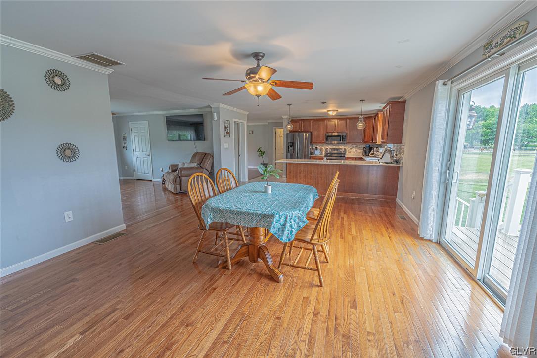 897 North Summit Road Bath, PA 18014 - Photo 7 of 35 a dining room with furniture and wooden floor