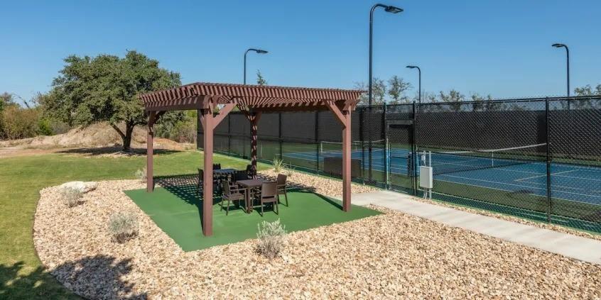 8405 Gullane Street Cleburne, TX 76033 - Photo 33 of 37 a view of a park with a slide