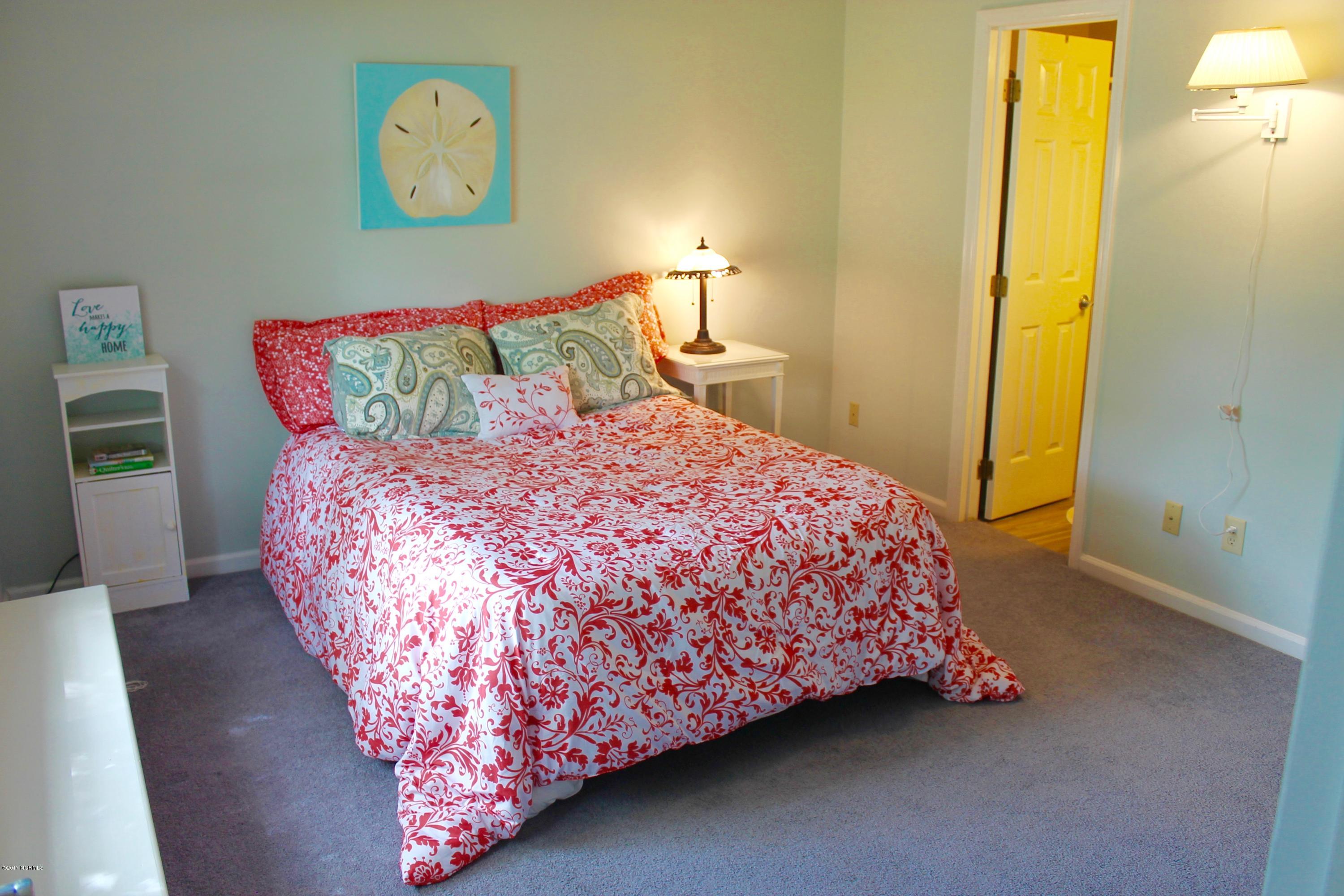 217 Fairford Road Castle Hayne, NC 28429 - Photo 11 of 17 Guest suite with full bath and room for a sitting area. Built in window seat too.