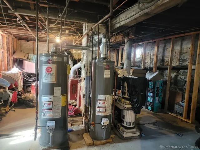 a view of a hallway view with wooden floor and staircase