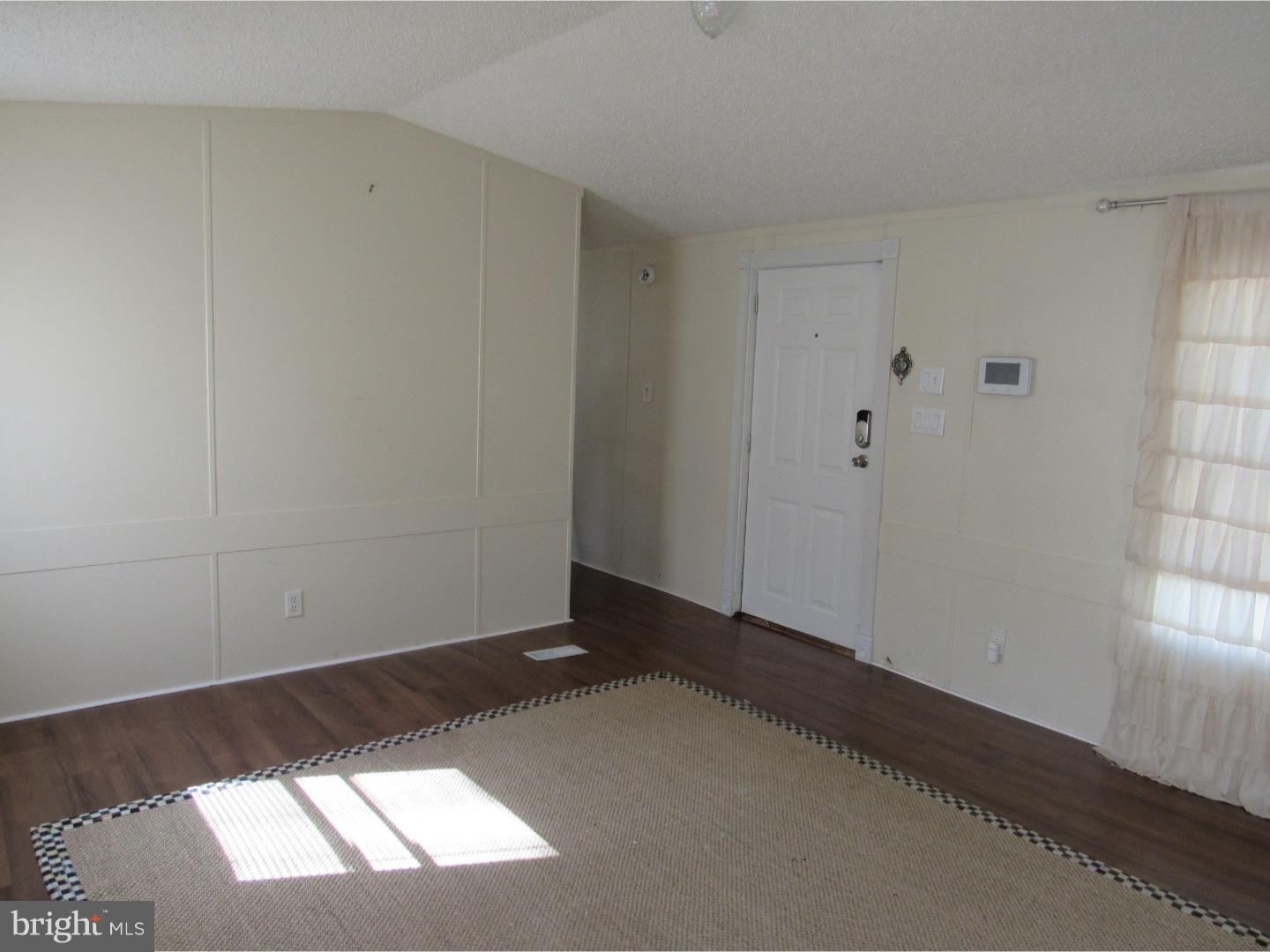 402 Oceanwind Road Bear, DE 19701 - Photo 4 of 19 Living Room