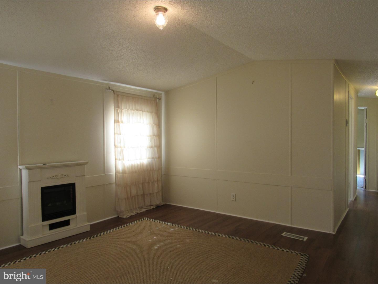 402 Oceanwind Road Bear, DE 19701 - Photo 5 of 19 Living Room