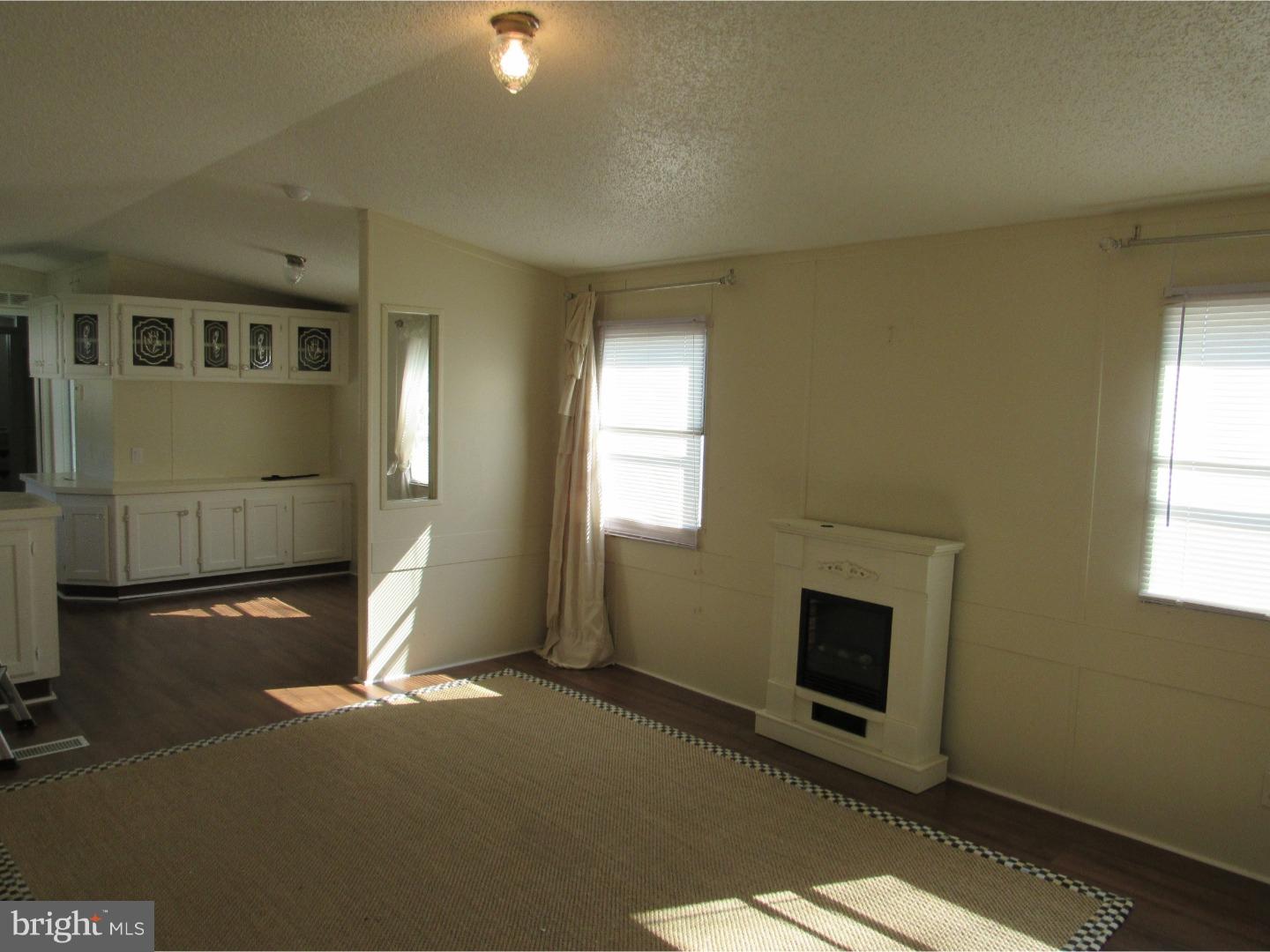 402 Oceanwind Road Bear, DE 19701 - Photo 7 of 19 Living Room