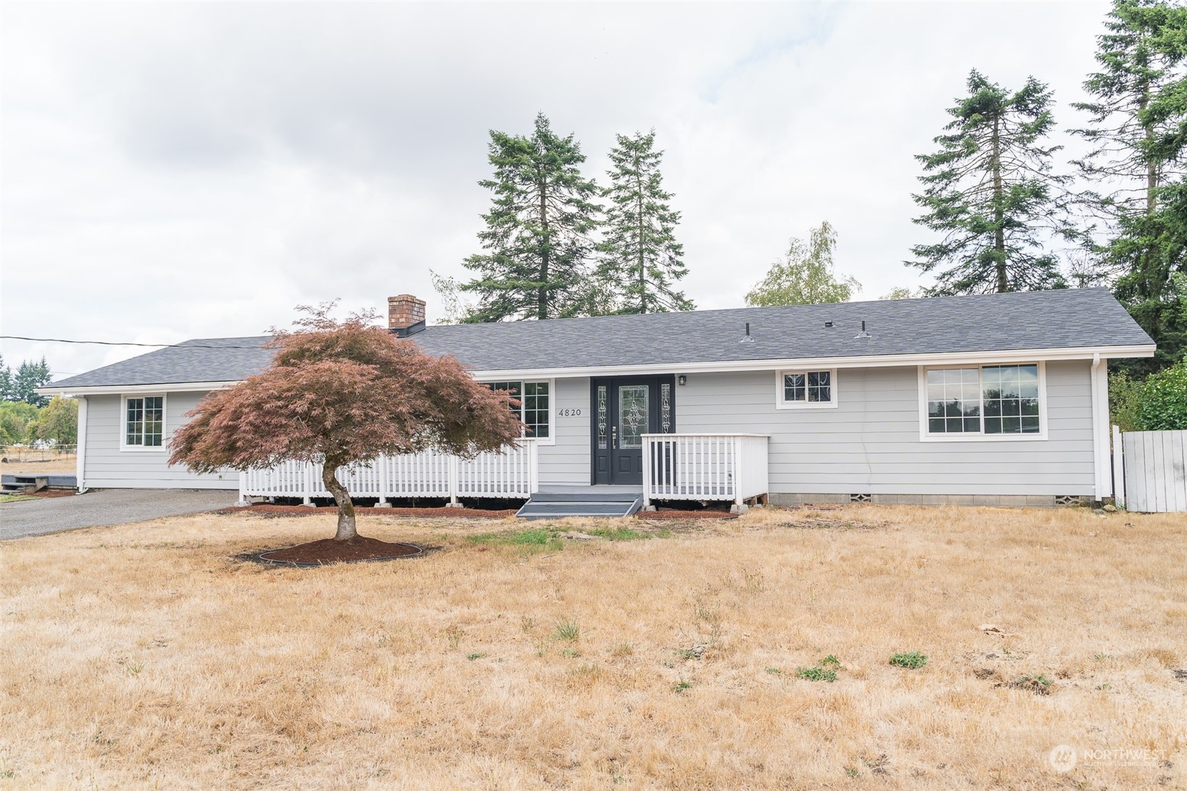 4820 176th Avenue Southwest Rochester, WA 98579 - Photo 2 of 40 front view of a house with a yard