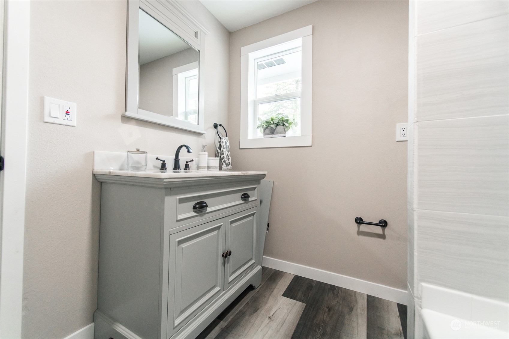 4820 176th Avenue Southwest Rochester, WA 98579 - Photo 22 of 40 a bathroom with a sink a vanity and a mirror