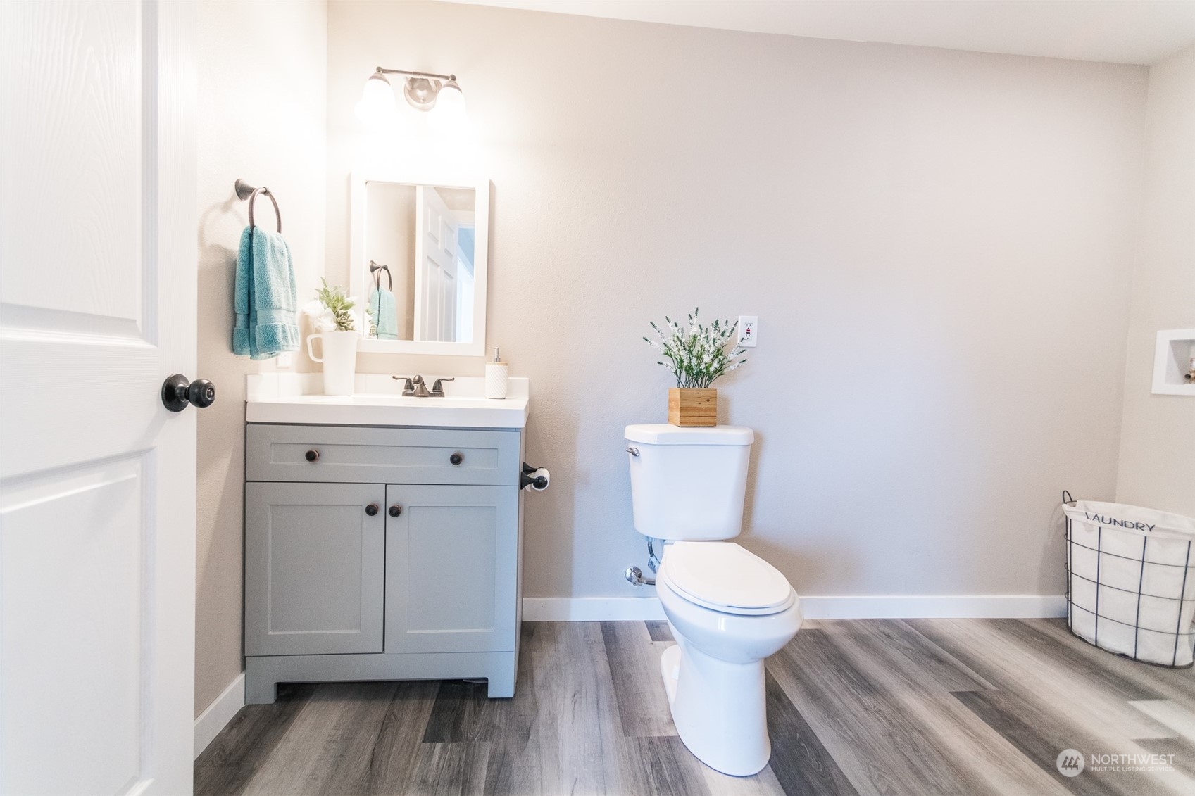 4820 176th Avenue Southwest Rochester, WA 98579 - Photo 23 of 40 a bathroom with a sink a toilet and a mirror