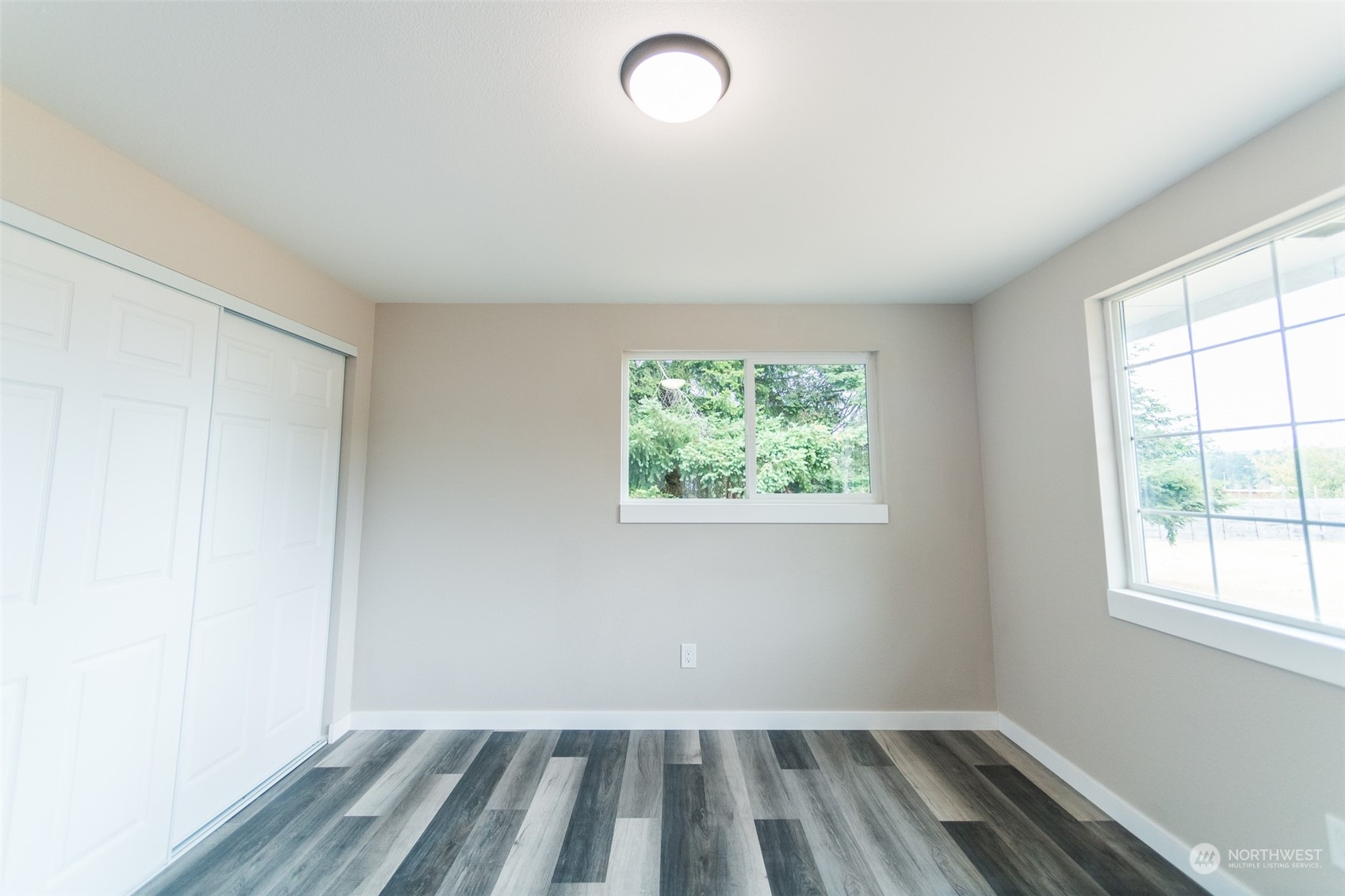4820 176th Avenue Southwest Rochester, WA 98579 - Photo 27 of 40 an empty room with windows
