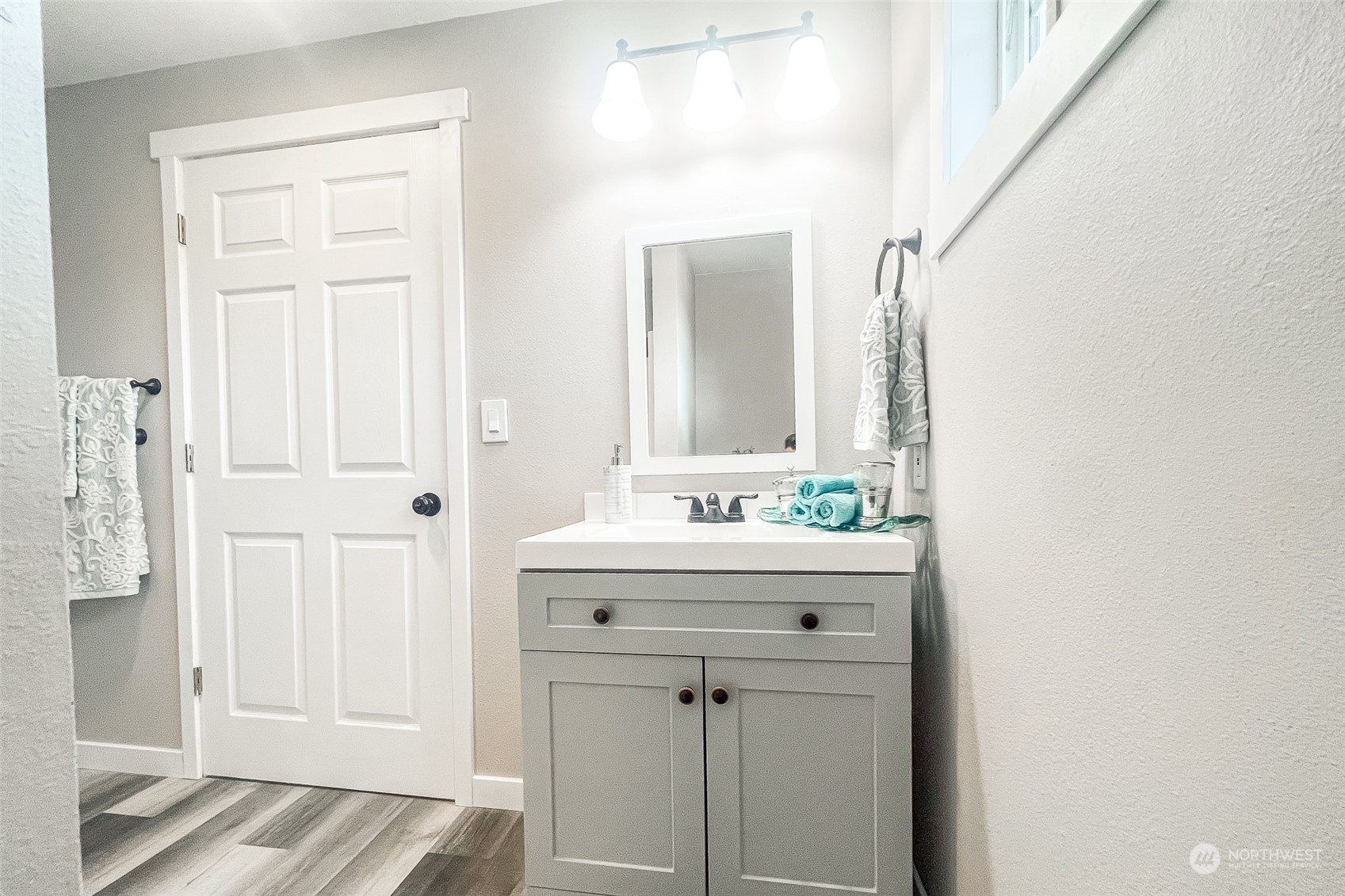 4820 176th Avenue Southwest Rochester, WA 98579 - Photo 30 of 40 a bathroom with a sink and a mirror