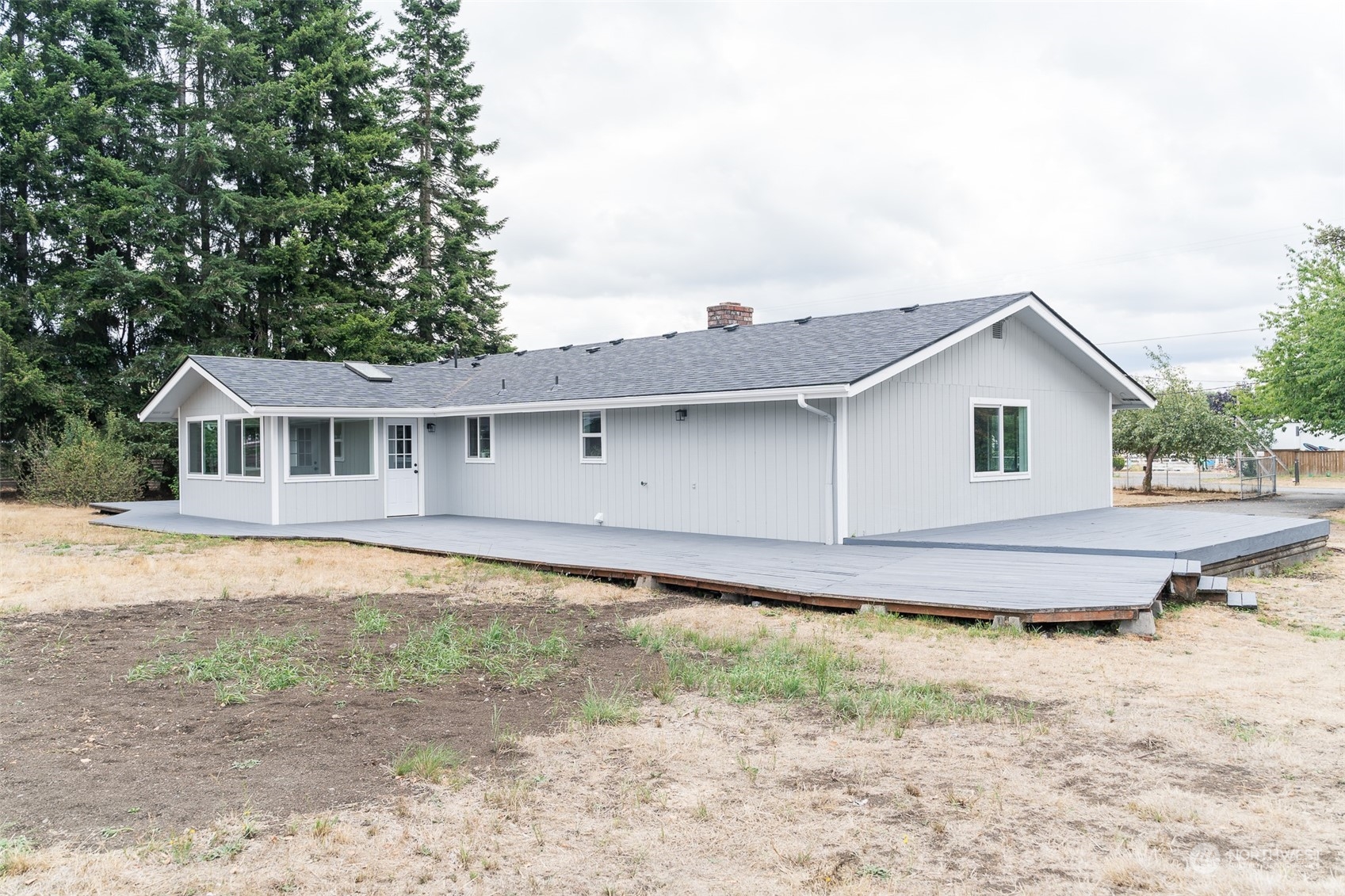 4820 176th Avenue Southwest Rochester, WA 98579 - Photo 38 of 40 a front view of house with yard and trees around