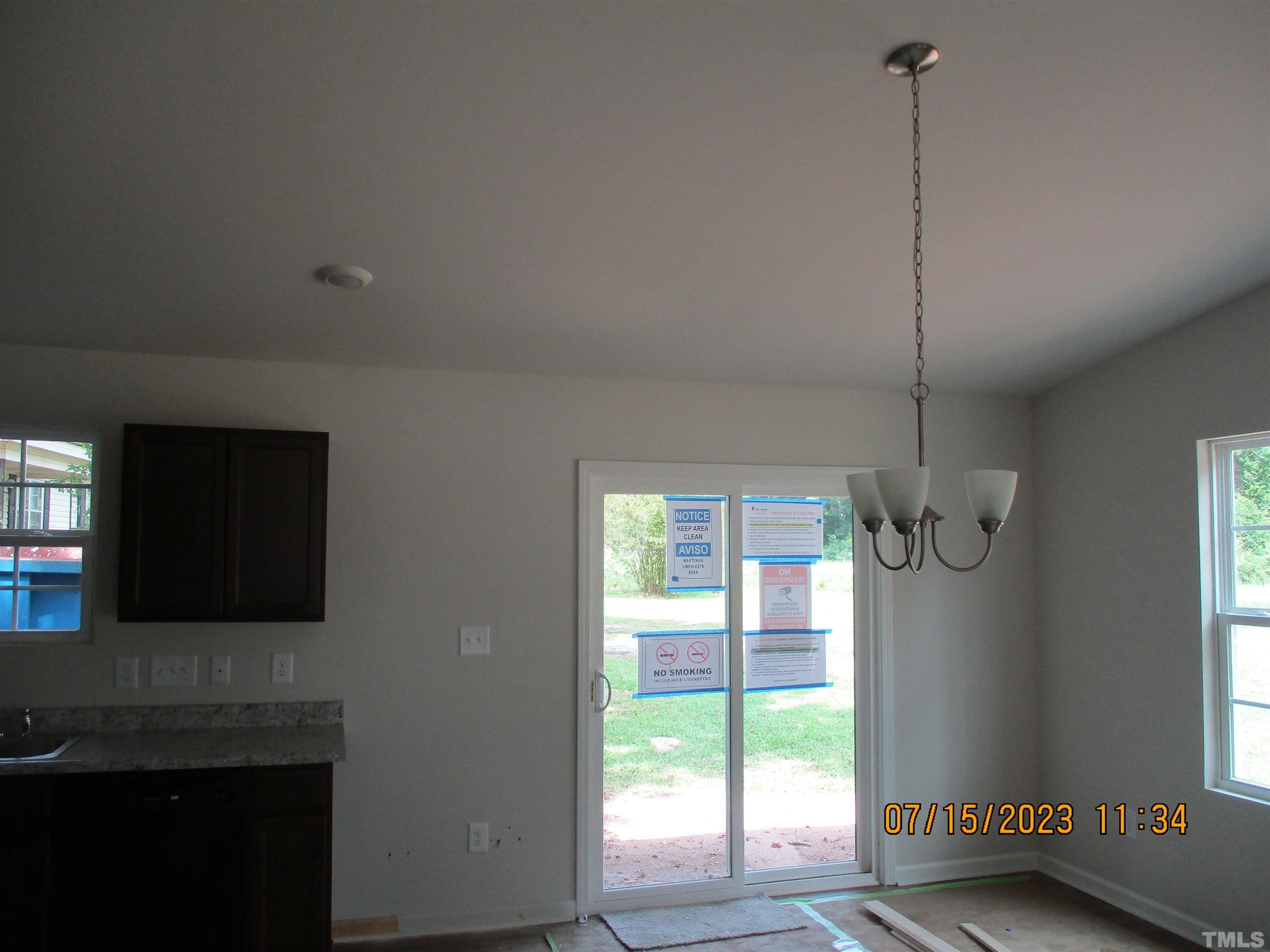 592 Rowan Road Clinton, NC 28328 - Photo 5 of 9 a view of an empty room with a window