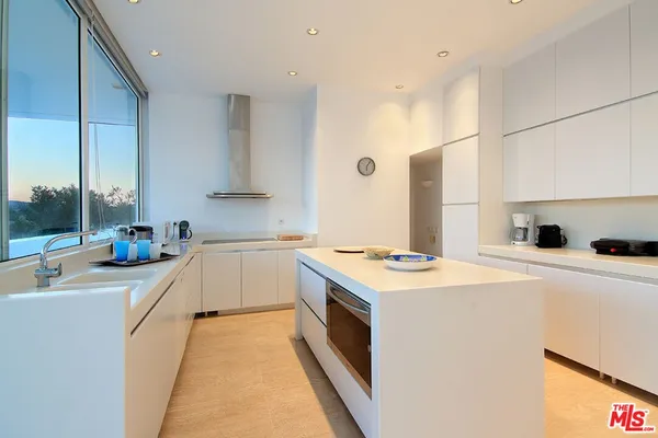 a bedroom with a bed and a cabinets