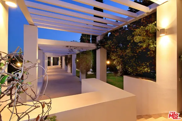 a view of a patio with a fountain