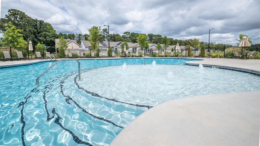 4915 Balsa Point Acworth, GA 30101 - Photo 2 of 24 a view of a swimming pool and an outdoor space