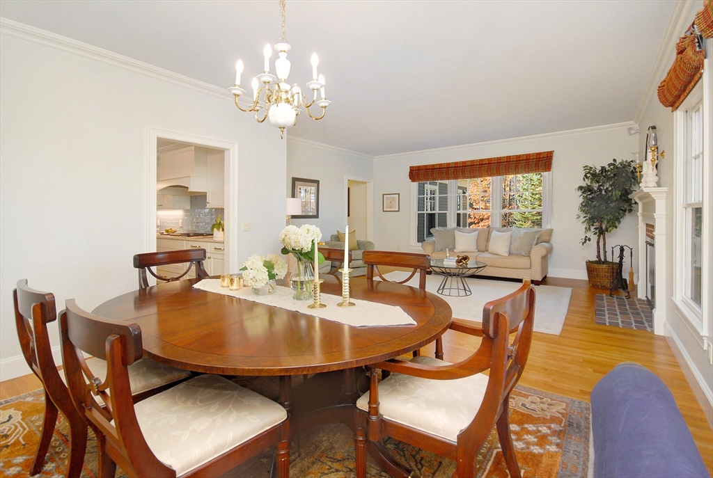 96 Forest Ridge Road, Unit 96 Concord, MA 01742 - Photo 13 of 36 a dining room with furniture and wooden floor