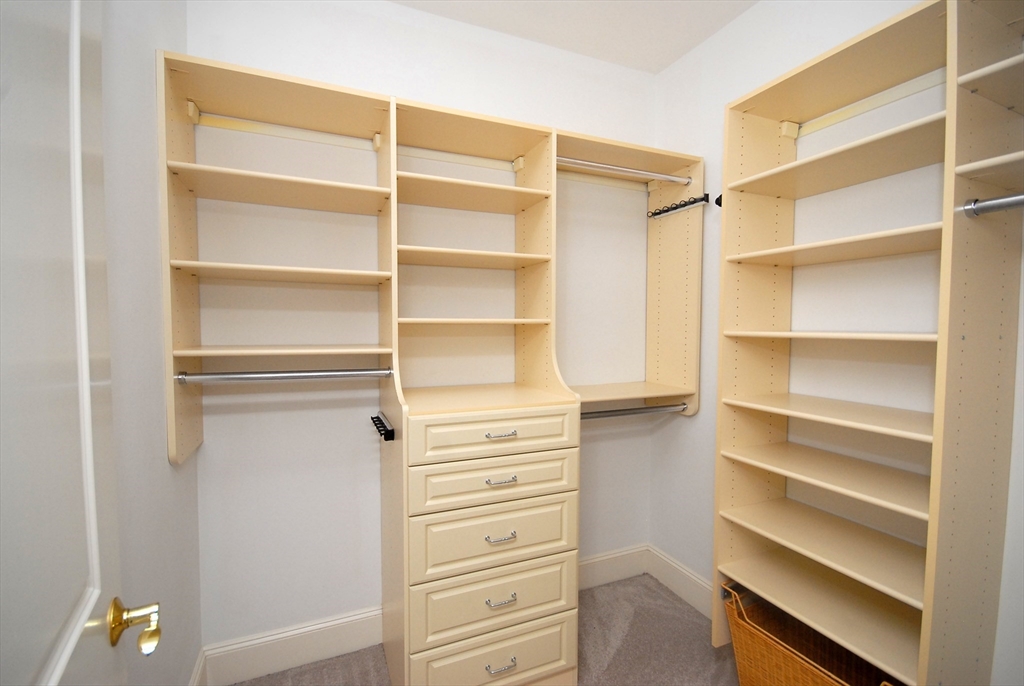 96 Forest Ridge Road, Unit 96 Concord, MA 01742 - Photo 20 of 36 a view of walk in closet with empty racks