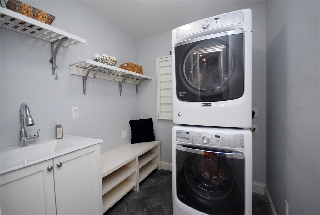96 Forest Ridge Road, Unit 96 Concord, MA 01742 - Photo 21 of 36 a utility room with dryer and washer