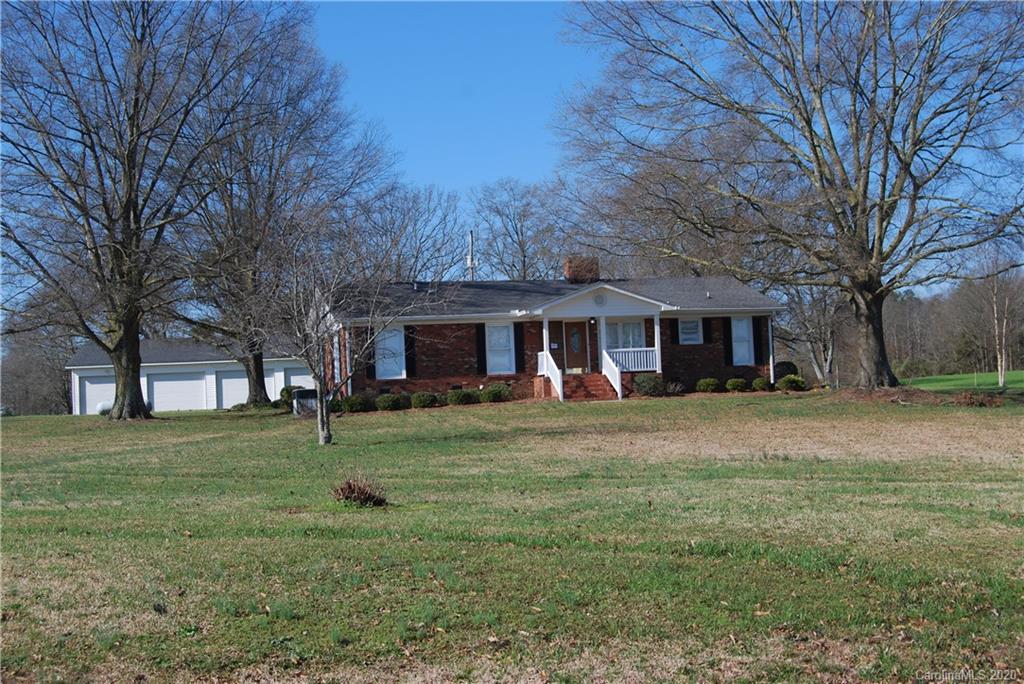 2716 Stack Road Monroe, NC 28112 - Photo 1 of 42 a view of a yard in front of the house