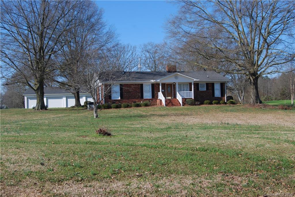 2716 Stack Road Monroe, NC 28112 - Photo 2 of 42 a view of a house with a yard