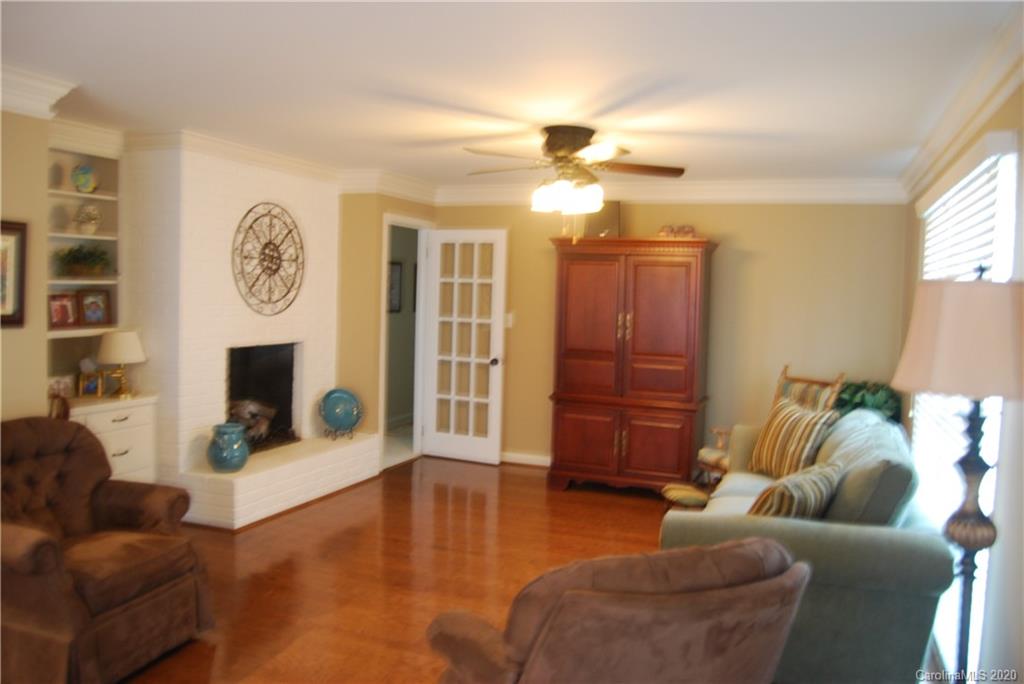 2716 Stack Road Monroe, NC 28112 - Photo 13 of 42 a living room with furniture and a fireplace