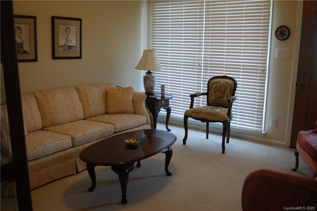 2716 Stack Road Monroe, NC 28112 - Photo 16 of 42 a living room with furniture and a potted plant