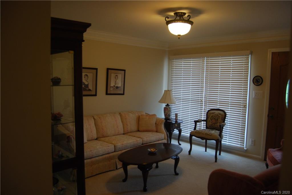 2716 Stack Road Monroe, NC 28112 - Photo 17 of 42 a living room with furniture and a window
