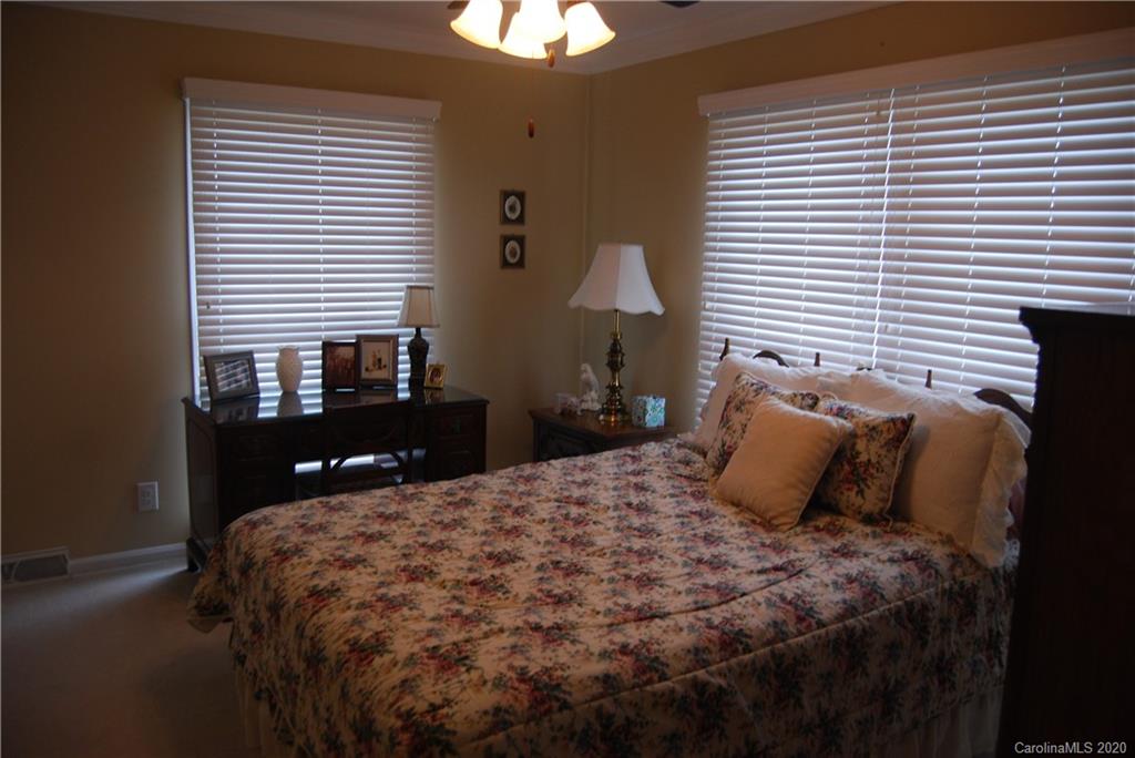 2716 Stack Road Monroe, NC 28112 - Photo 20 of 42 a bedroom with a bed and a window