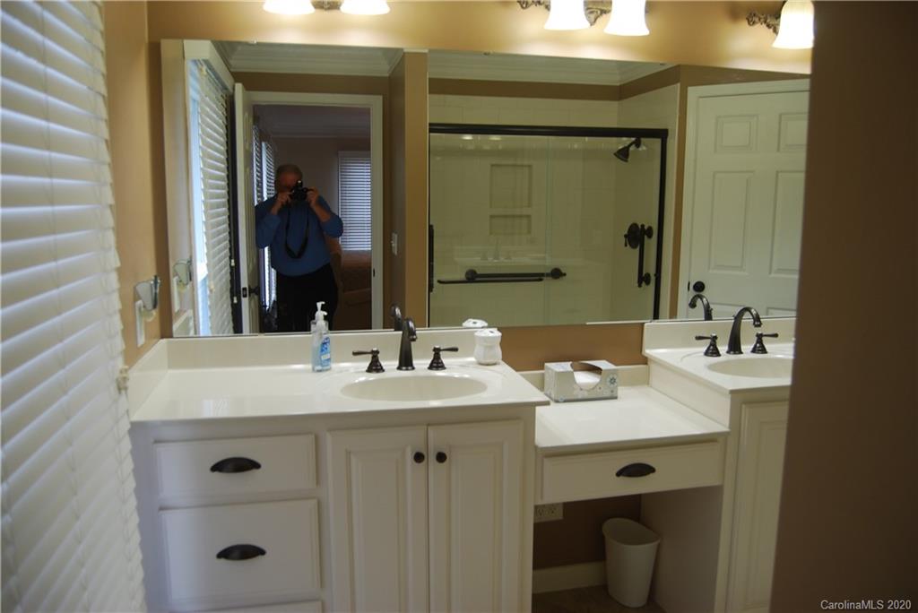2716 Stack Road Monroe, NC 28112 - Photo 26 of 42 a bathroom with a sink and a mirror