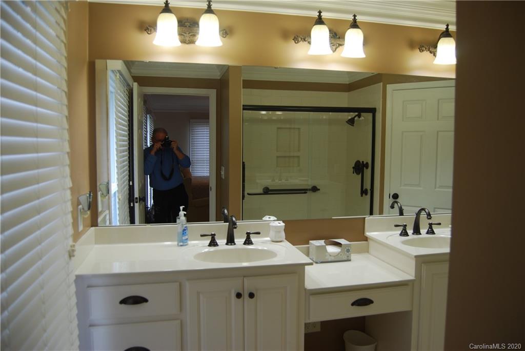 2716 Stack Road Monroe, NC 28112 - Photo 27 of 42 a bathroom with a sink and a mirror