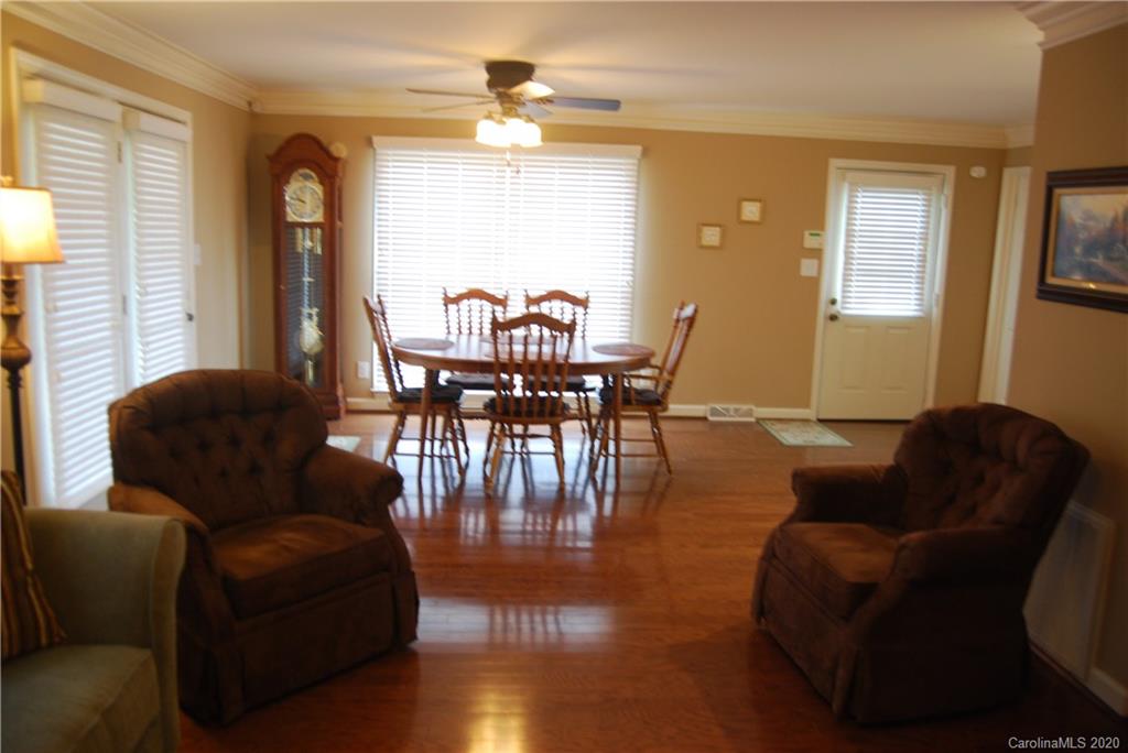 2716 Stack Road Monroe, NC 28112 - Photo 34 of 42 a living room with furniture and wooden floor