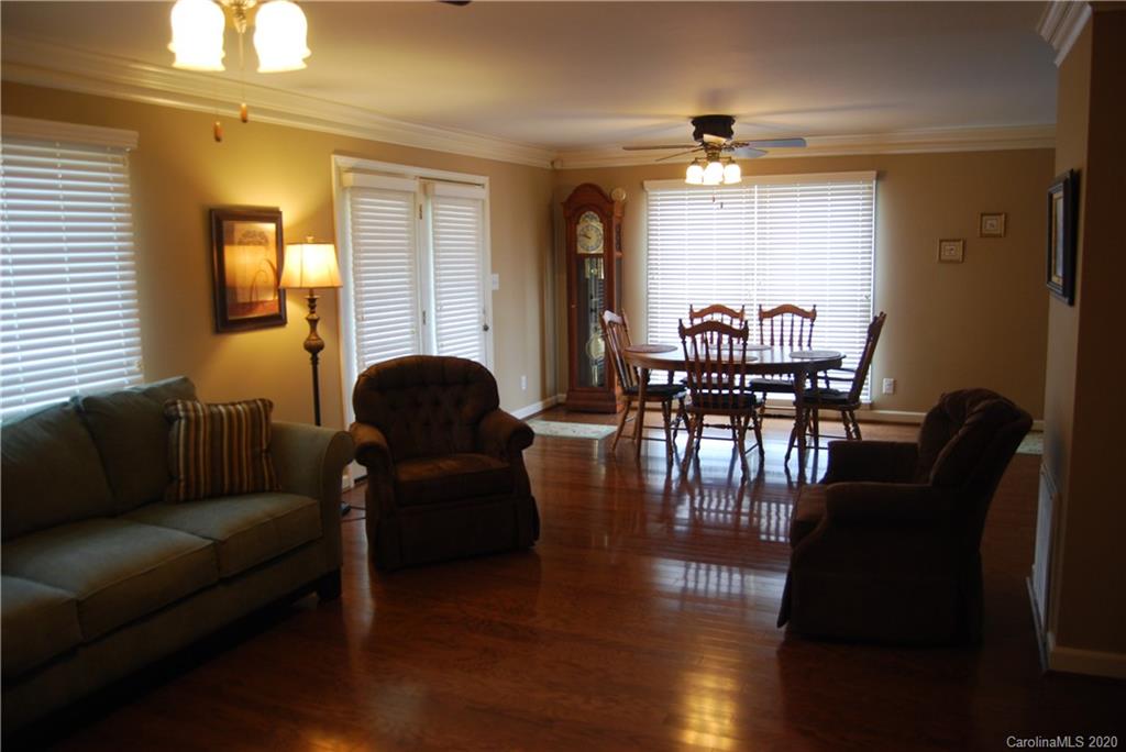 2716 Stack Road Monroe, NC 28112 - Photo 38 of 42 a living room with furniture and wooden floor