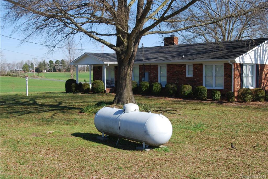 2716 Stack Road Monroe, NC 28112 - Photo 6 of 42 a view of a house with backyard and sitting area