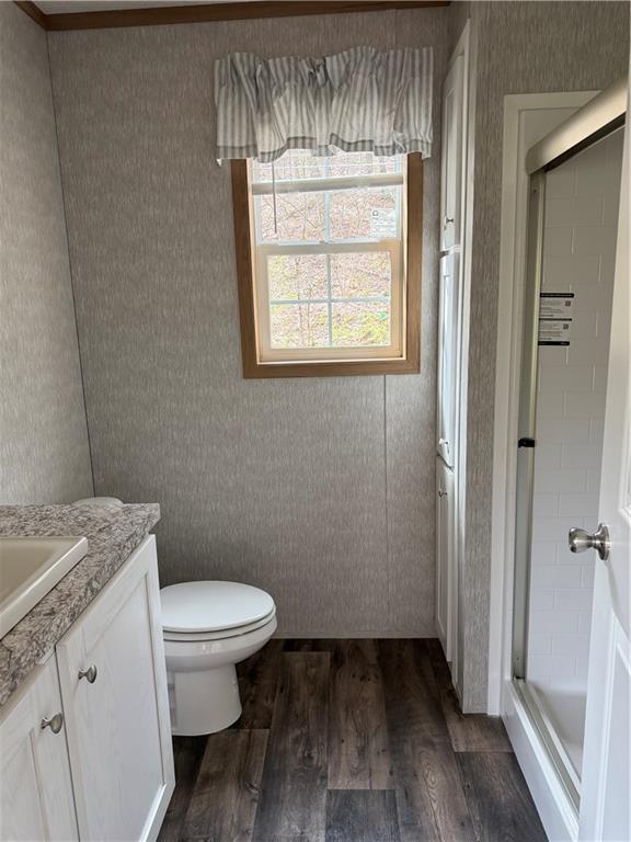 206 Iron Furnace Road East Brady, PA 16028 - Photo 9 of 12 a white toilet sitting next to a bathroom sink