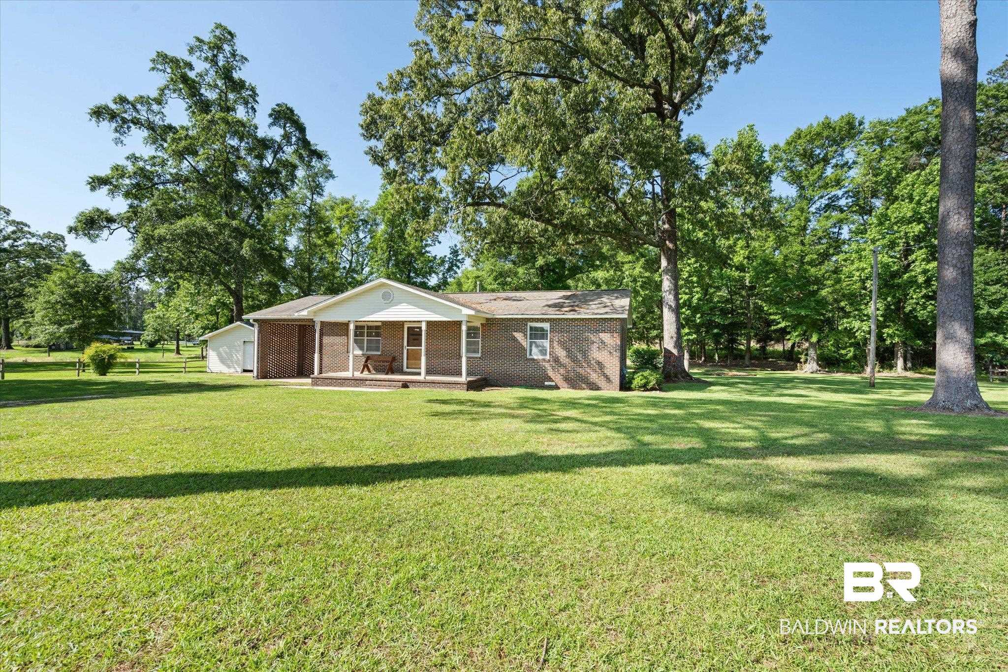 427 Upper Ferry Road Leroy, AL 36548 - Photo 21 of 37 View of front of home featuring a front yard and brick siding