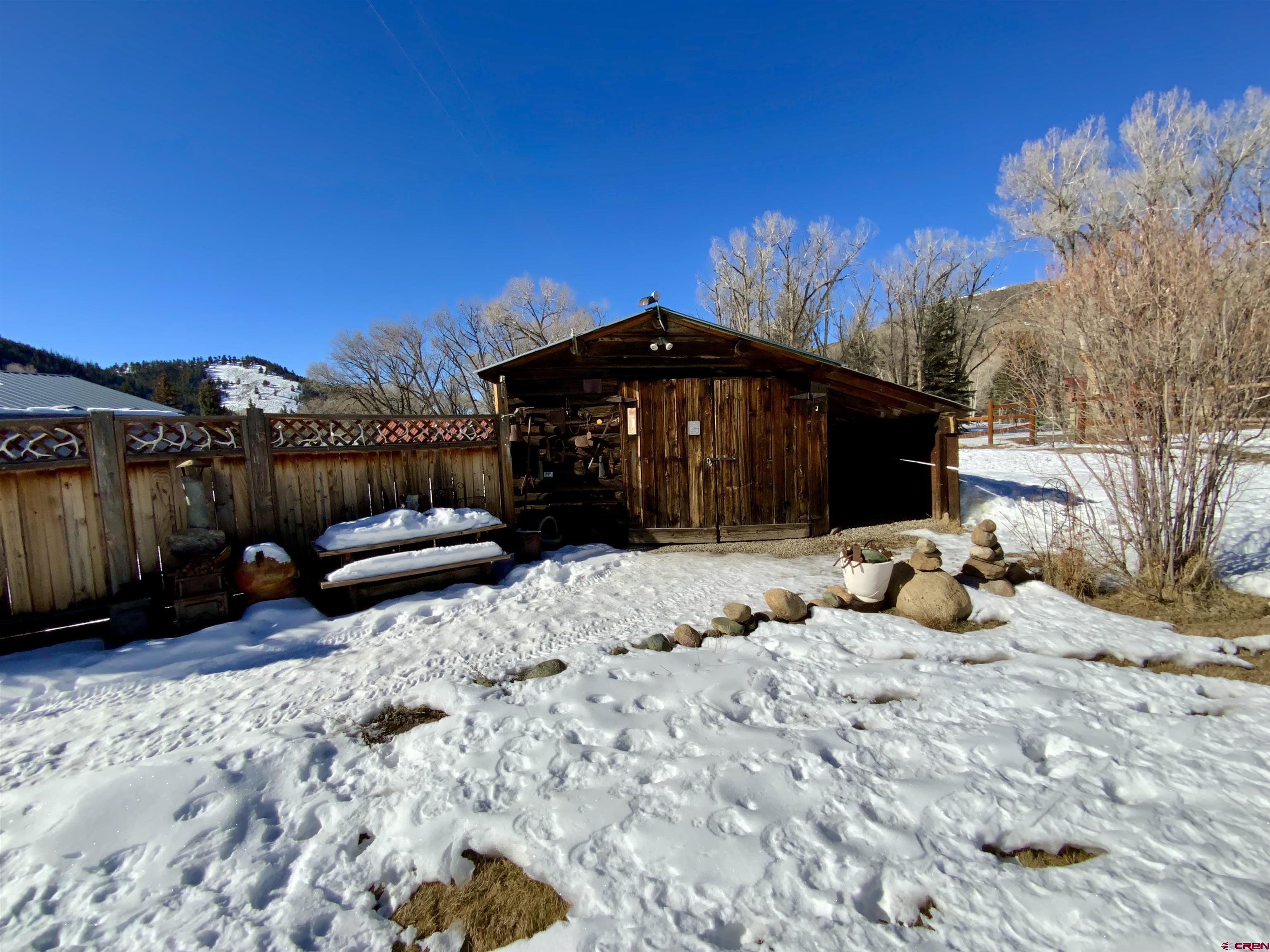 8639 County Road 76 Ohio City, CO 81237 - Photo 26 of 26 a view of a house with a yard