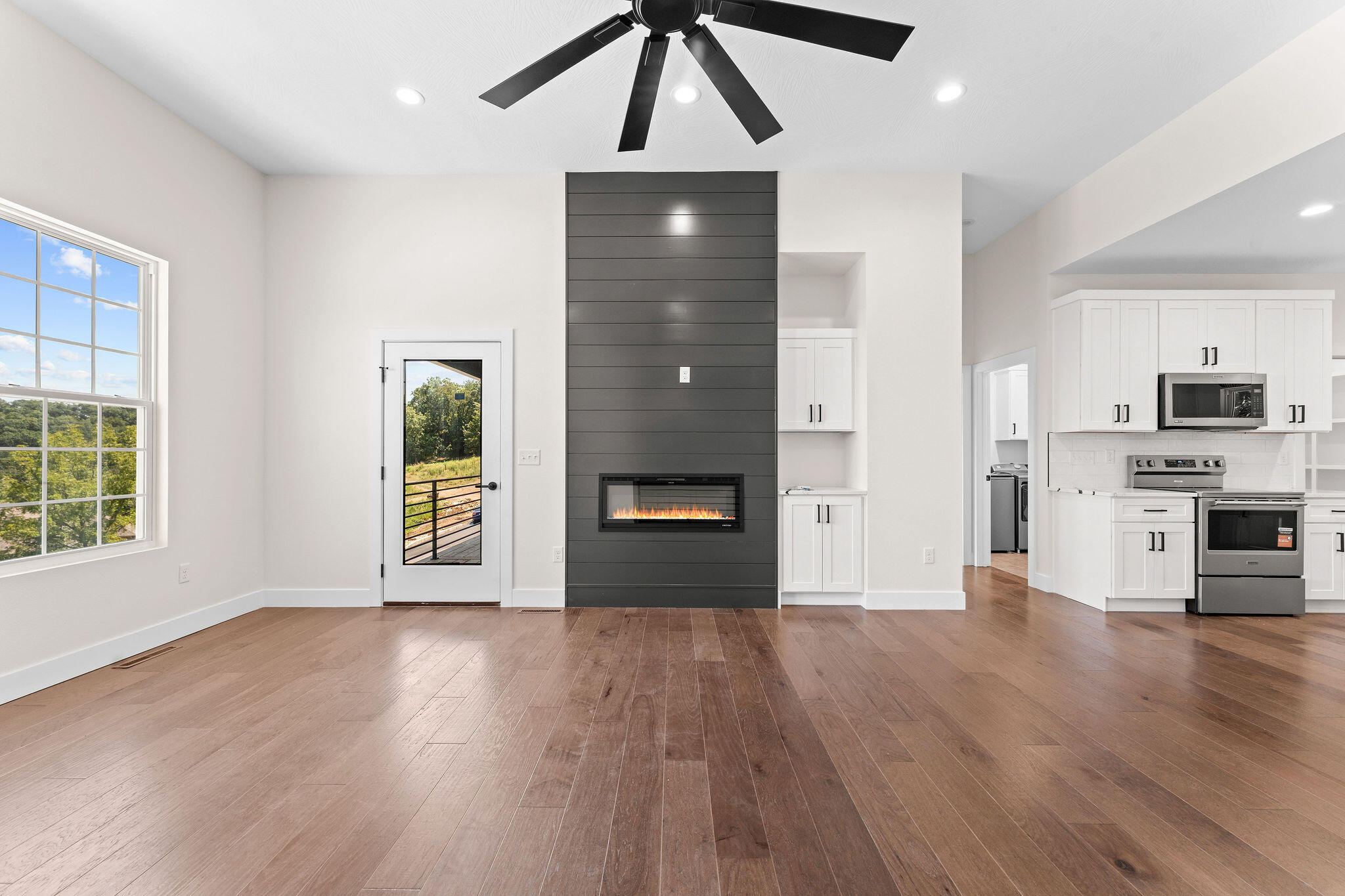 186 Jacks Hollow Road Walnut Shade, MO 65771 - Photo 9 of 28 Living Room with Cozy Fireplace