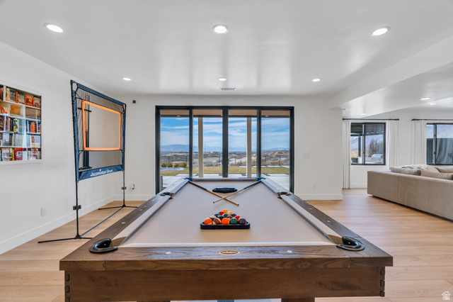 3918 South Mapleton Ests Drive Mapleton, UT 84664 - Photo 71 of 103 Recreation room with light wood finished floors, pool table, a mountain view, and recessed lighting