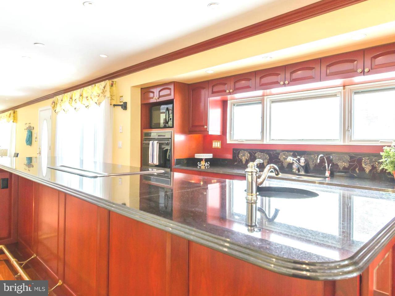 13423 Blenfield Road Phoenix, MD 21131 - Photo 11 of 30 Kitchen island w/ bar sink